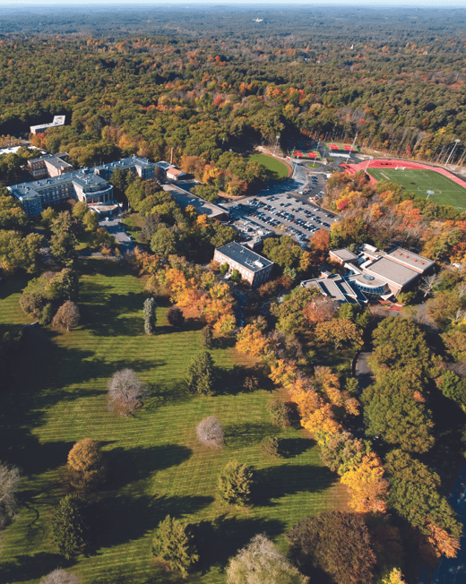 an aerial photo of the Regis campus during fall