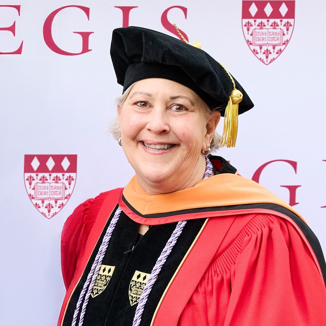 Headshot of Donna Barry in full academic regalia