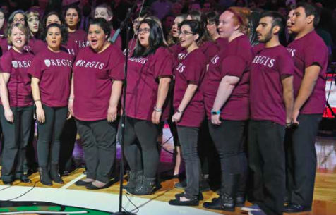 Glee Singers performing in Regis t-shirts