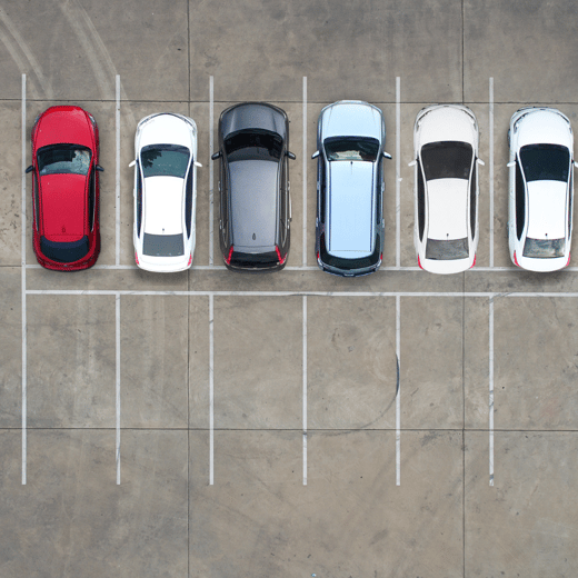 Aerial view of a half-filled parking lot